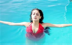 Spellbinding beauty Gurleen Chopra, swimming in red bikini